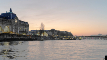 Sunset view of the Seine River with the Musée d'Orsay and Pont Royal from a cruise in Paris
