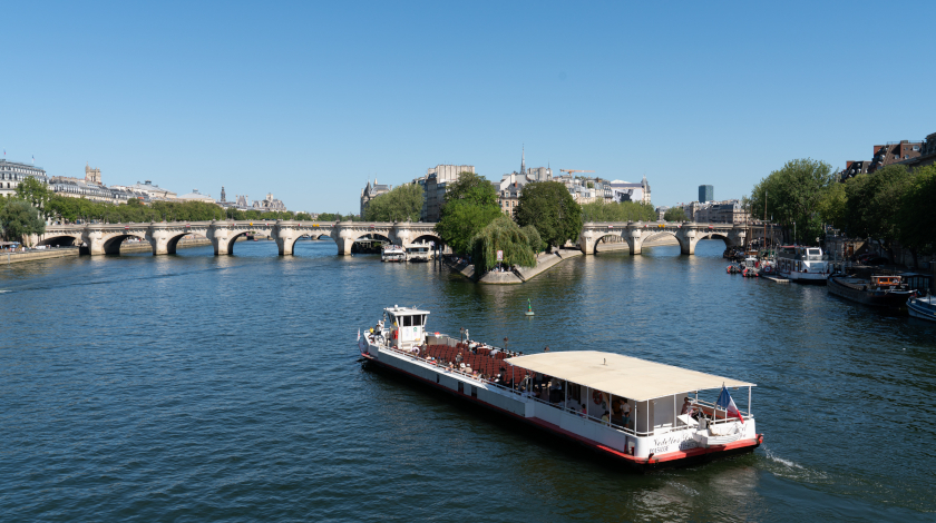 The Europa boat passing by the Pont Neuf during a Seine river cruise