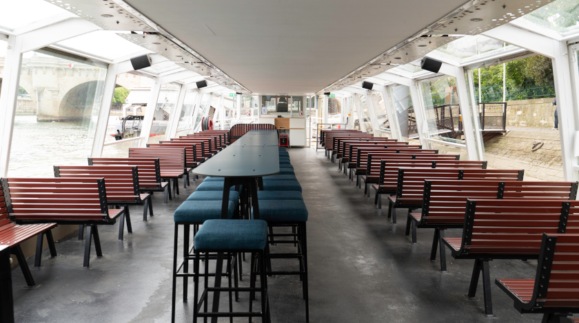 Interior of the Hydraseine boat with a bar for passengers